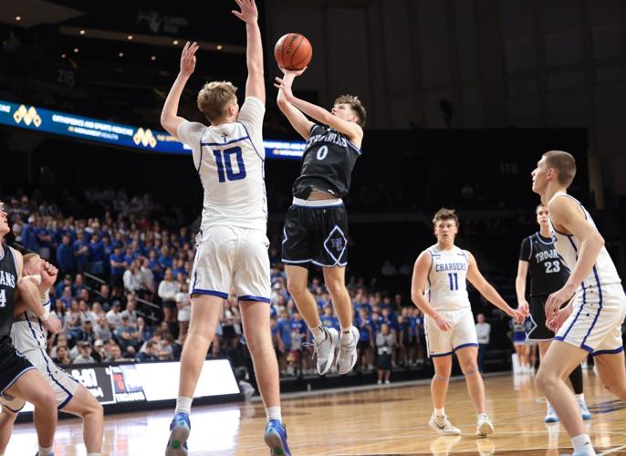 West Central player attacking the basket during the championship